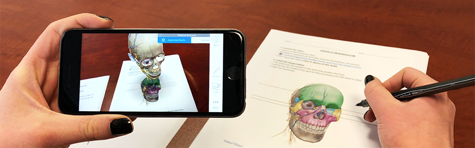 Visible Body showing Augmented Reality with a skull on a table