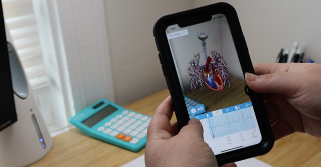 Students using augmented reality to study muscle actions