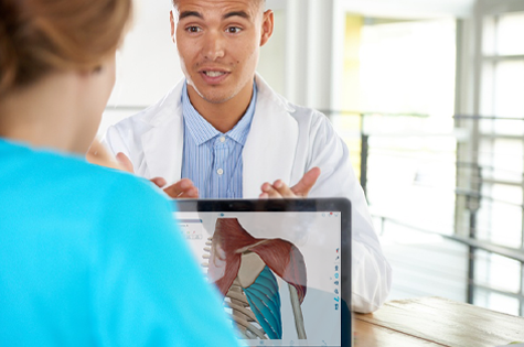 Medical Professionals using Visible Body apps on a tablet